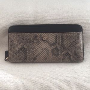 Diane Von Furstenberg snake effect leather wallet.